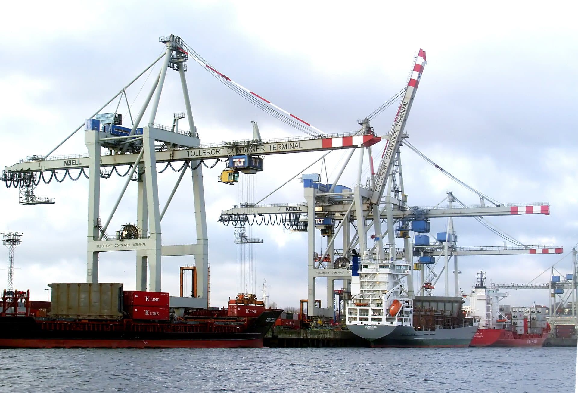 Deepwater international container harbor with gantry cranes and container vessels